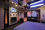 King sized bed with canopy, bubble panel lights, bubble column lights, wet bar, fireplace, flat screen TV and AM/FM stereo
