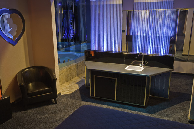 Wet bar, bubble panel lights, hot tub and chair
