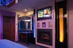 Flat screen TV, AM/FM stereo, fireplace and bubble column lights