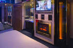 42" LCD flat screen TV, AM/FM stereo, fireplace, bubble column lights and wet bar with refrigerator
