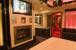 Color TV, AM/FM stereo, bubble panel lights and fireplace